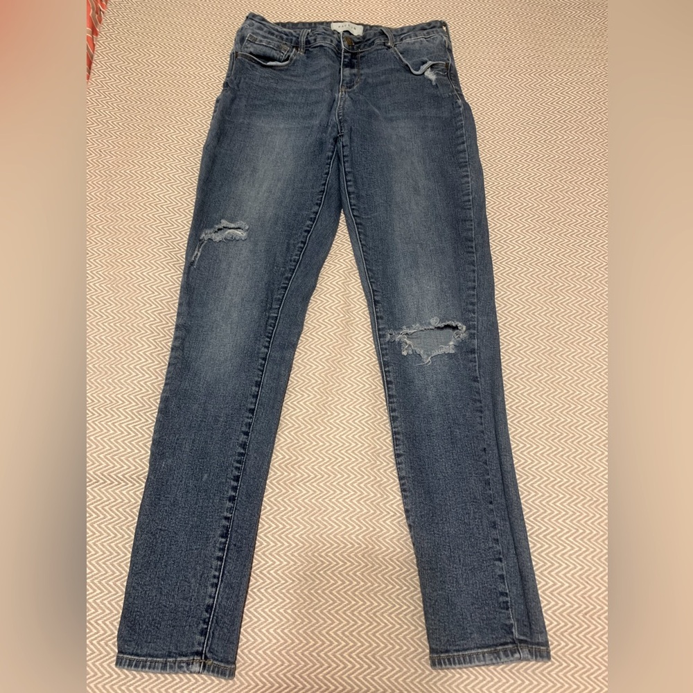 Pacsun low rise skinniest jeans. Medium wash. Distressed knees. Size 28.